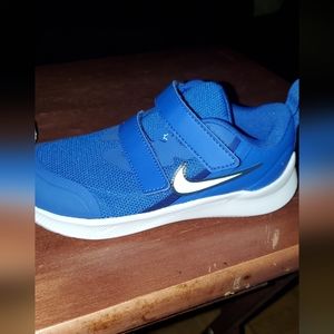 Size 10c blue and white Nike star runner